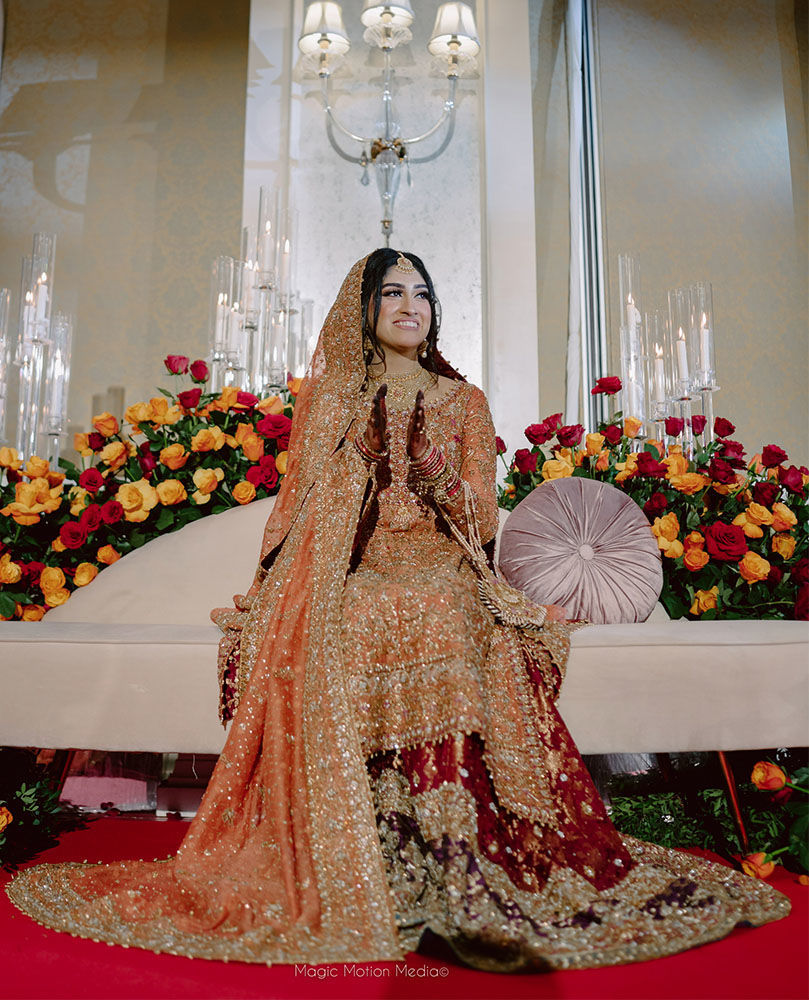 FARAH TALIB AZIZ GIVES US A MASTERCLASS ON HOW TO CARRY THE ICONIC BRUNT ORANGE BRIDAL.