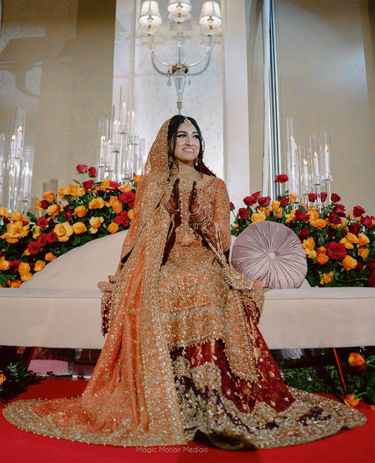 FARAH TALIB AZIZ GIVES US A MASTERCLASS ON HOW TO CARRY THE ICONIC BRUNT ORANGE BRIDAL.