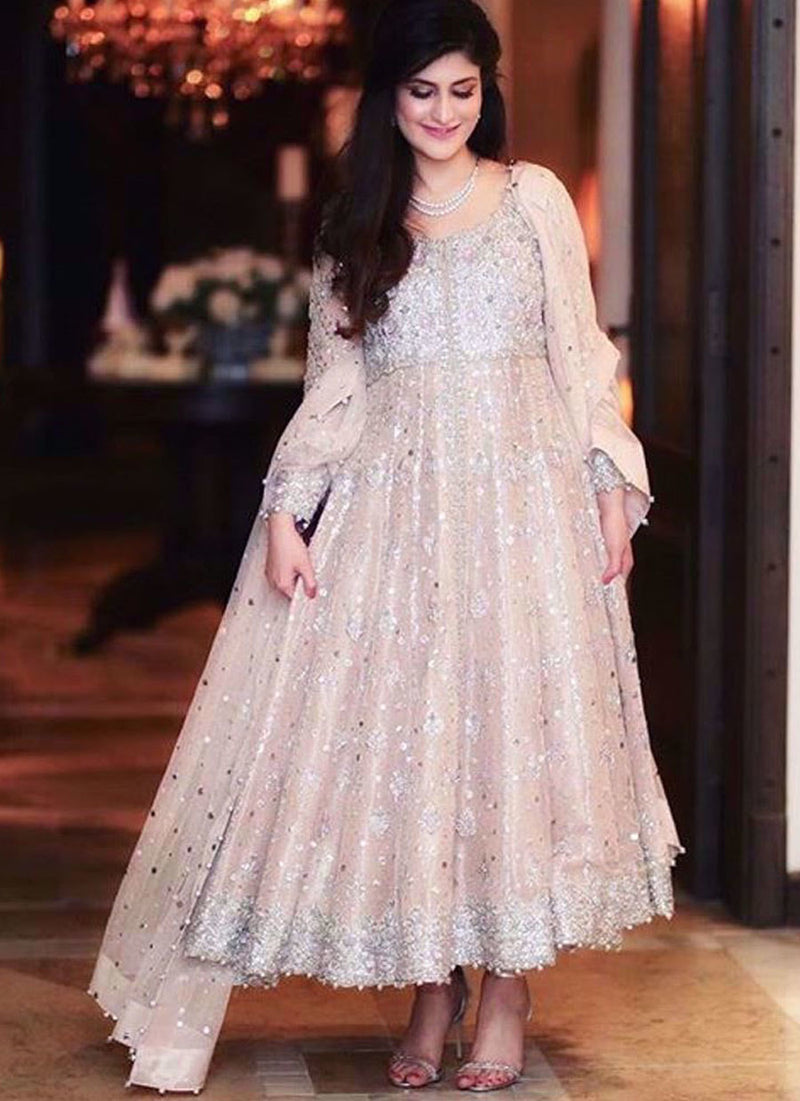 Absolutely adoring this beautiful bride sparkling in a tea rose Farah Talib Aziz signature kalidaar peshwas