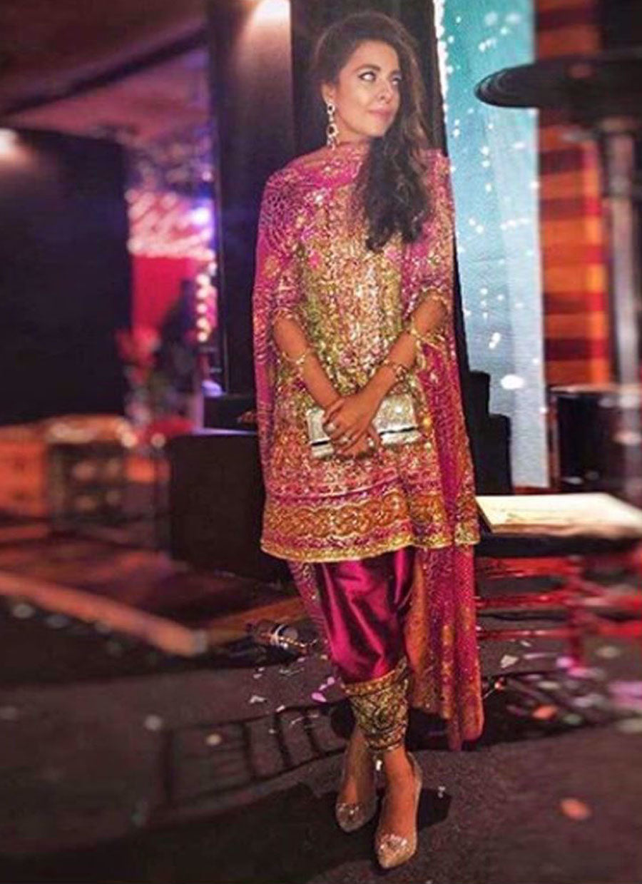Maliha Aziz in a Farah Talib Aziz kiwi green and magenta kalidaar paired with a chunri chaddar and kharri shalwar