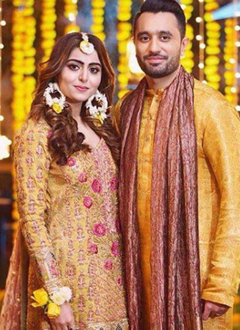 Sara in a saffron yellow kalidaar paired with a mint gharara