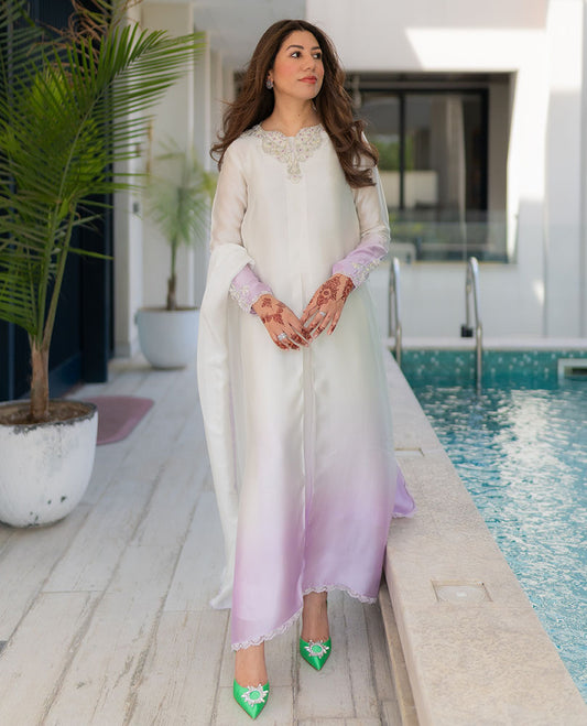 Shines bright in our LIQUE SILVER OMBRE EMBELLISHED KAFTAAN CUT SHIRT.