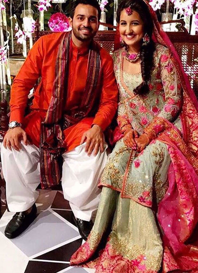 Zara Tariq looks absolutely radiant in a teal and magenta Farah Talib Aziz kalidaar angarkha