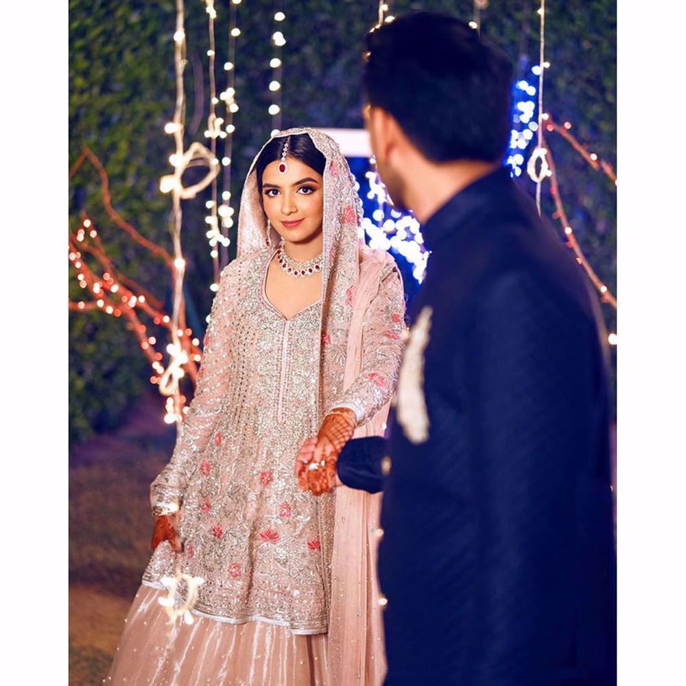 A breathtaking bride on her engagement day in a blush Farah Talib Aziz bridal