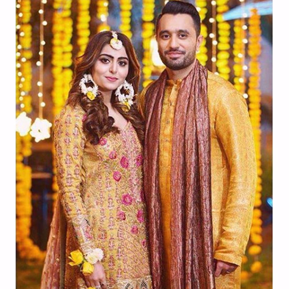 Sara in a saffron yellow kalidaar paired with a mint gharara