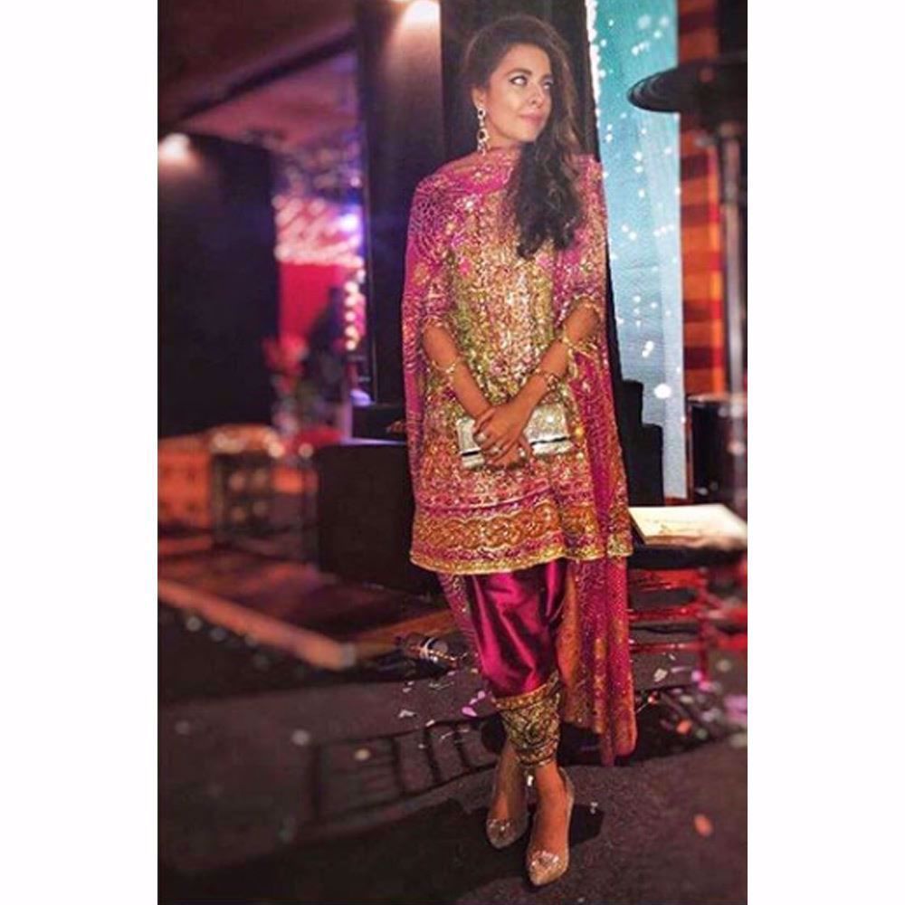 Maliha Aziz in a Farah Talib Aziz kiwi green and magenta kalidaar paired with a chunri chaddar and kharri shalwar