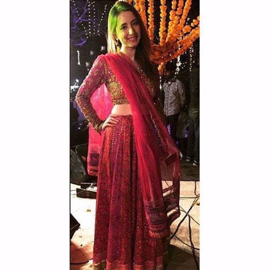 Komal Aziz Khan looks picture perfect in a magenta Farah Talib Aziz lengha choli