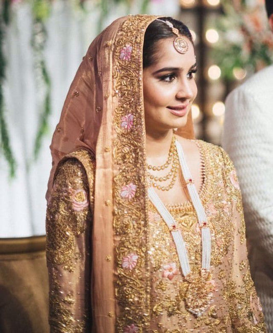 Zahra Khan looking exquisite at her wedding in a traditional #Farah Talib Aziz ensemble