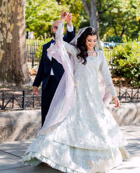 Nissa Chaudhry ravishing at her wedding, in ice-cool shades of pale blue and lavender, accentuated with silver embellishments and silk thread work