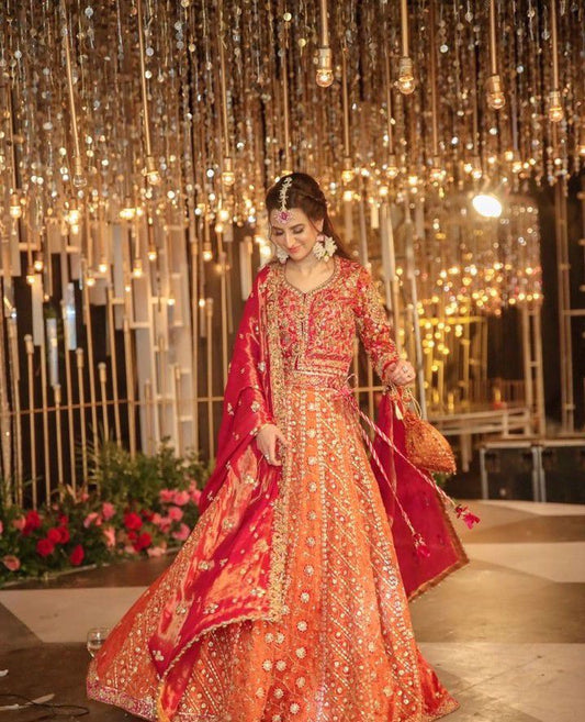 Marwa makes an absolutely striking bride in a custom #FarahTalibAziz lehnga choli. Bright, uplifting hues, intricate embroideries and yards of fine fabrics create a truly memorable look