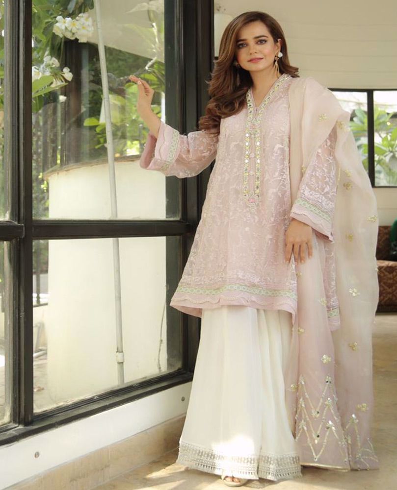 ⁠#SumbulIqbal beautiful in our Mauve Sheesh kurta. Just the perfect amount of delicate sheesha embroidery layered over a delicate floral tapestry make this ensemble truly irresistible!