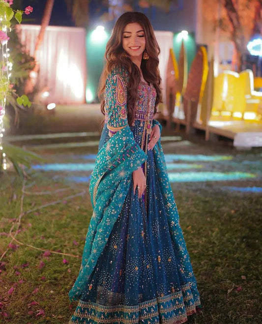 The gorgeous Kinza Hashmi has all eyes on her in our Neha Peacock ensemble